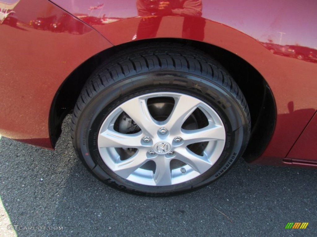 2010 Mazda MAZDA3 i Touring 4 Door Wheel Photo #59080631