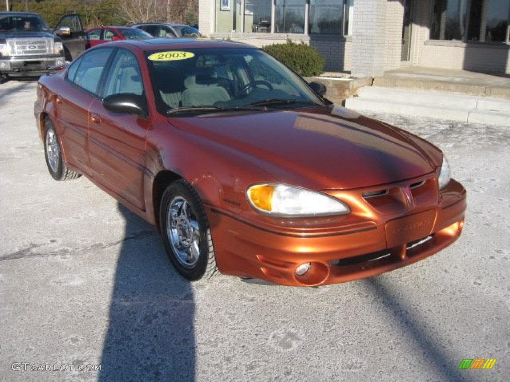 2003 Grand Am GT Sedan - Fusion Orange Metallic / Dark Pewter photo #1