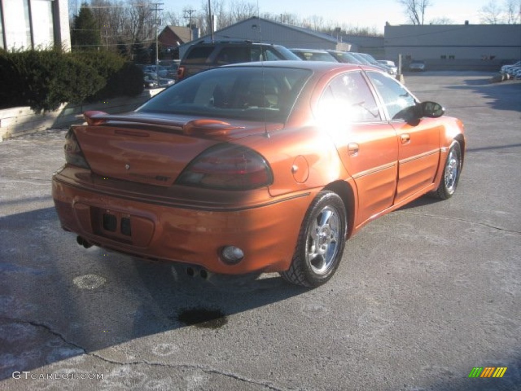 2003 Grand Am GT Sedan - Fusion Orange Metallic / Dark Pewter photo #6