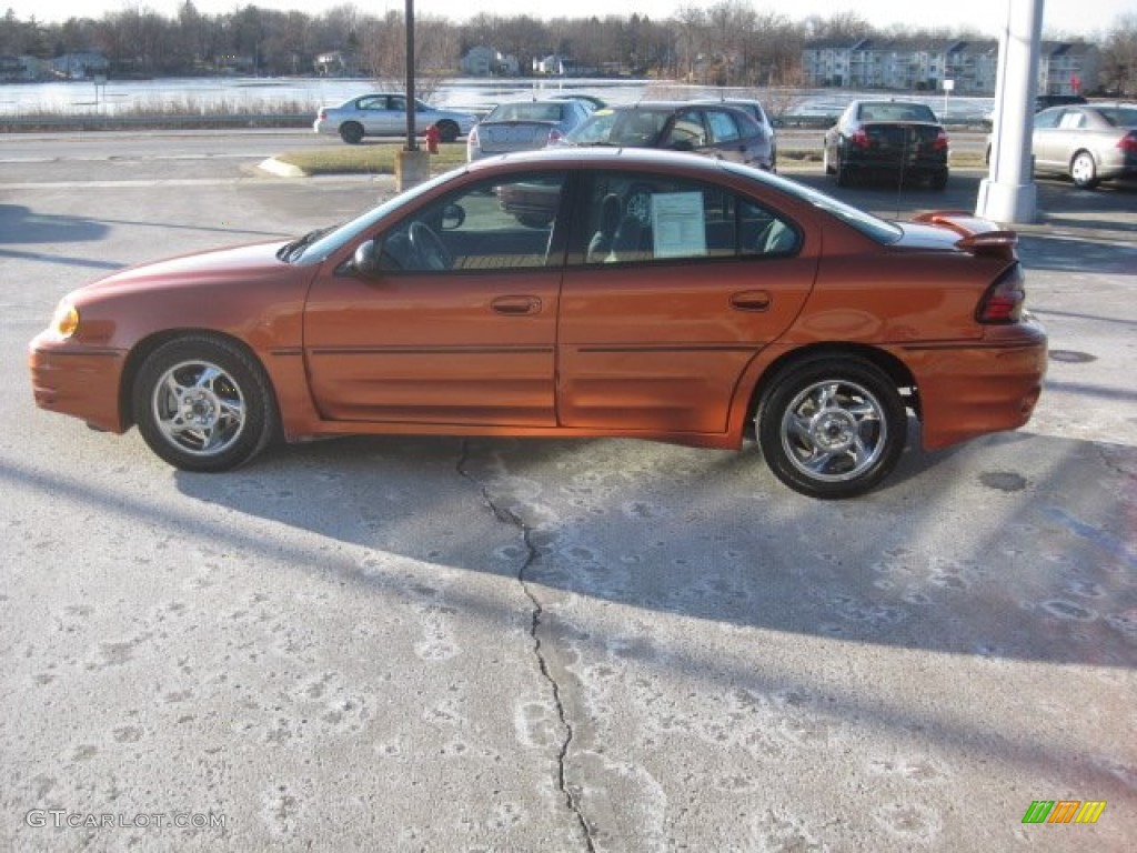 2003 Grand Am GT Sedan - Fusion Orange Metallic / Dark Pewter photo #9