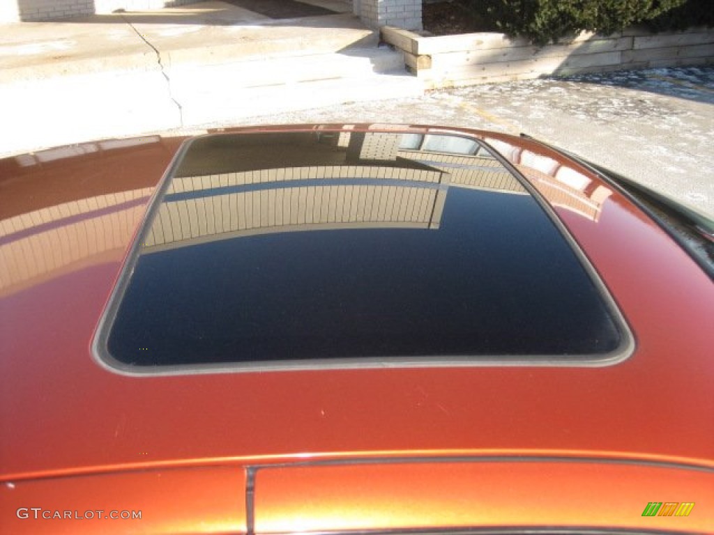 2003 Grand Am GT Sedan - Fusion Orange Metallic / Dark Pewter photo #16