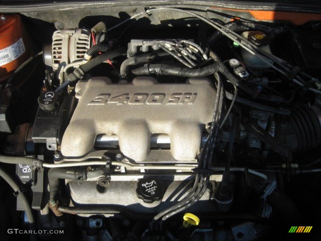 2003 Grand Am GT Sedan - Fusion Orange Metallic / Dark Pewter photo #32