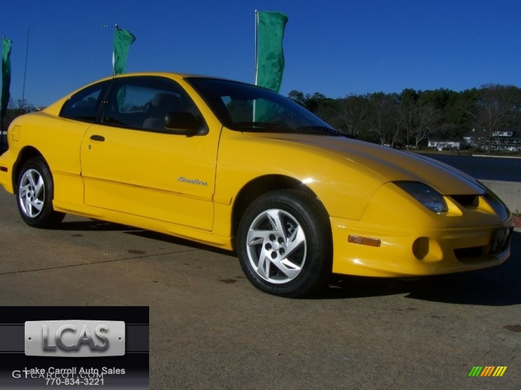 2002 Sunfire SE Coupe - Yellow / Graphite photo #1