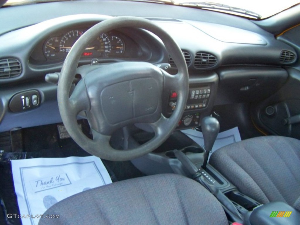 2002 Sunfire SE Coupe - Yellow / Graphite photo #13