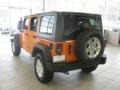 2012 Crush Orange Jeep Wrangler Unlimited Sport S 4x4  photo #2