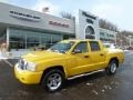 2007 Detonator Yellow Dodge Dakota SLT Quad Cab 4x4  photo #1