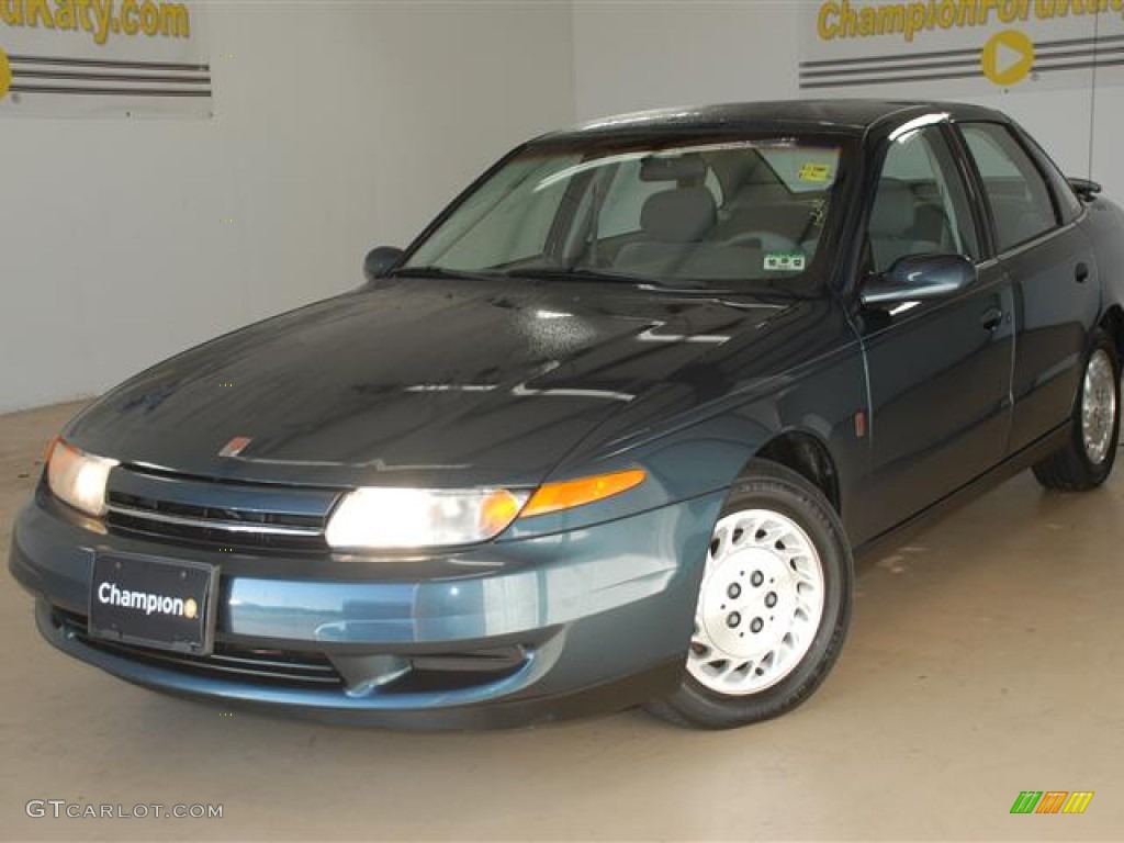 2002 L Series L100 Sedan - Medium Blue / Gray photo #1
