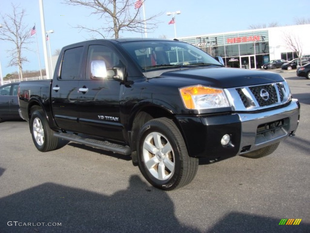 2009 Titan LE Crew Cab 4x4 - Galaxy Black / Almond photo #2