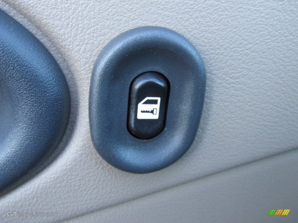 2005 Cavalier LS Sedan - Sunburst Orange Metallic / Neutral Beige photo #16