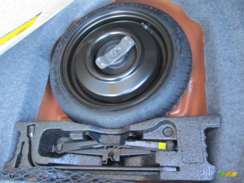 2005 Cavalier LS Sedan - Sunburst Orange Metallic / Neutral Beige photo #26