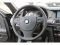 Black 2011 BMW 7 Series ActiveHybrid 750Li Sedan Steering Wheel