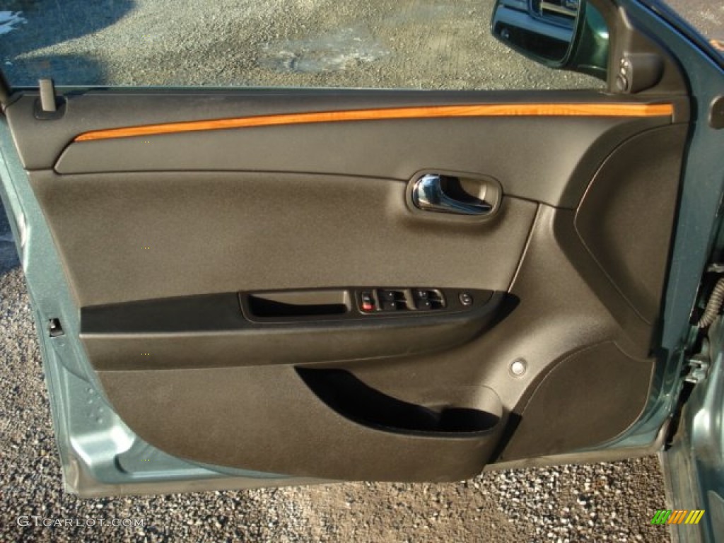 2009 Chevrolet Malibu LT Sedan Ebony Door Panel Photo #59281947