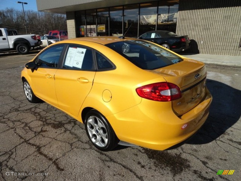 Yellow Blaze Metallic Tri-Coat 2011 Ford Fiesta SEL Sedan Exterior Photo #59285610