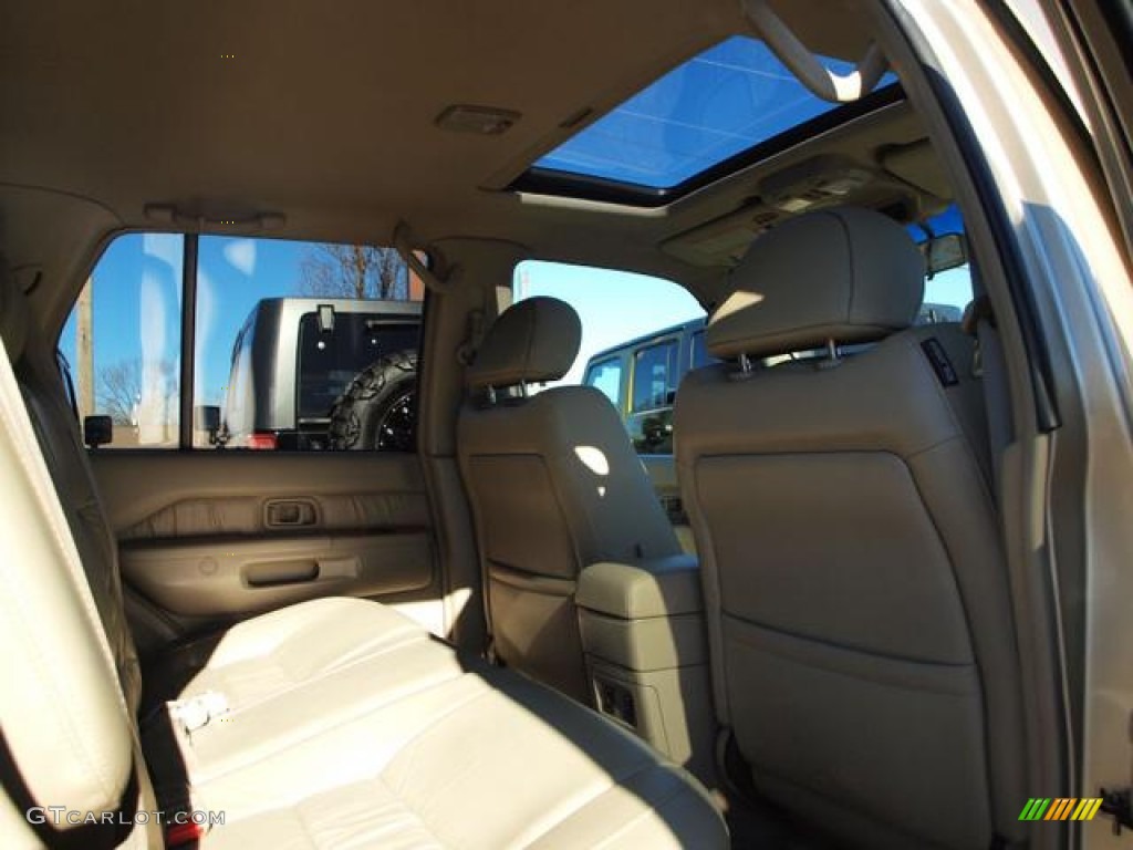 2001 QX4 4x4 - Tuscan Beige Metallic / Stone Beige photo #9