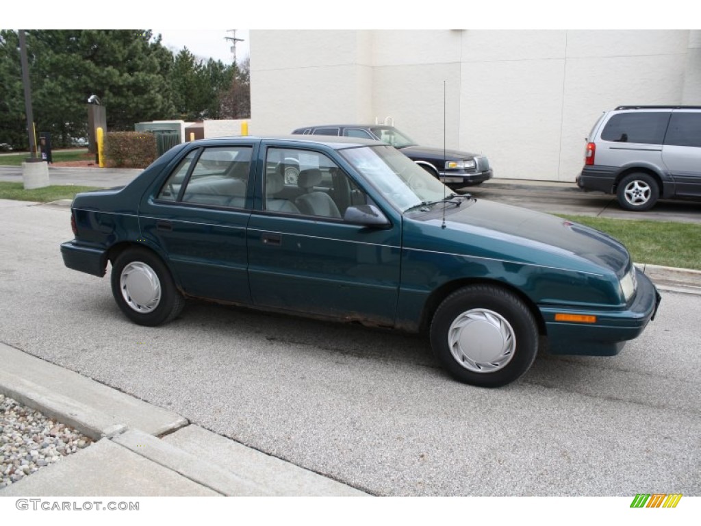 1993 Sundance Sedan - Emerald Green Pearl Metallic / Gray photo #11