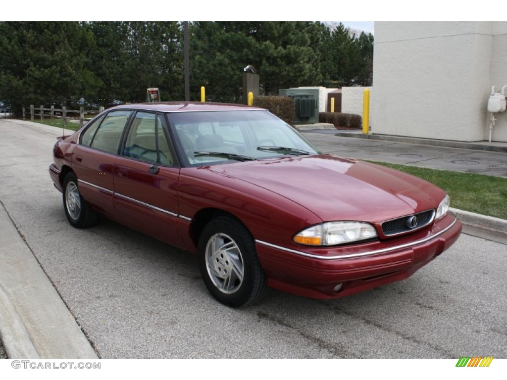 1995 Bonneville SE - Medium Red Metallic / Beige photo #1