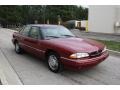 1995 Medium Red Metallic Pontiac Bonneville SE #59243256