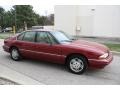 1995 Medium Red Metallic Pontiac Bonneville SE  photo #9