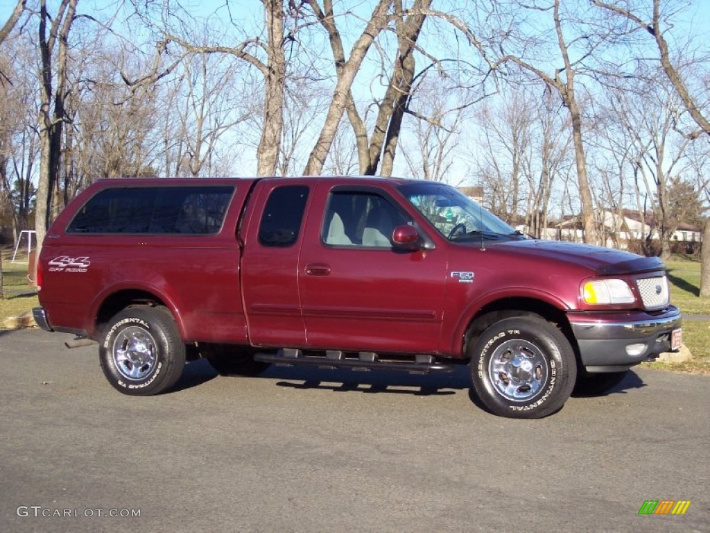 1999 F150 XLT Extended Cab 4x4 - Toreador Red Metallic / Dark Graphite photo #2