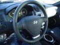 Black 2004 Hyundai Tiburon Standard Tiburon Model Steering Wheel