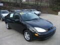 2003 Pitch Black Ford Focus SE Sedan  photo #5