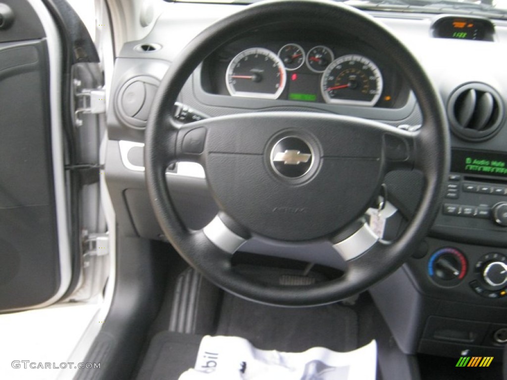 2010 Chevrolet Aveo LT Sedan Charcoal Steering Wheel Photo #59388415