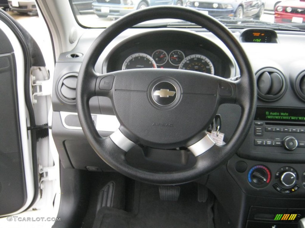 2010 Chevrolet Aveo LT Sedan Charcoal Steering Wheel Photo #59388628