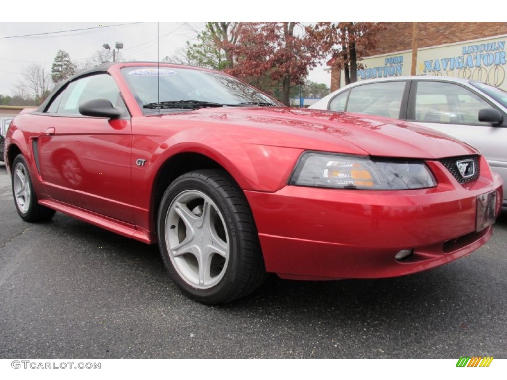 Laser Red Metallic 2000 Ford Mustang GT Convertible Exterior Photo #59390156