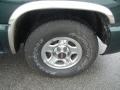 2004 GMC Sierra 1500 SLE Extended Cab Wheel and Tire Photo