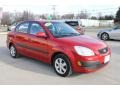 Tropical Red - Rio LX Sedan Photo No. 12
