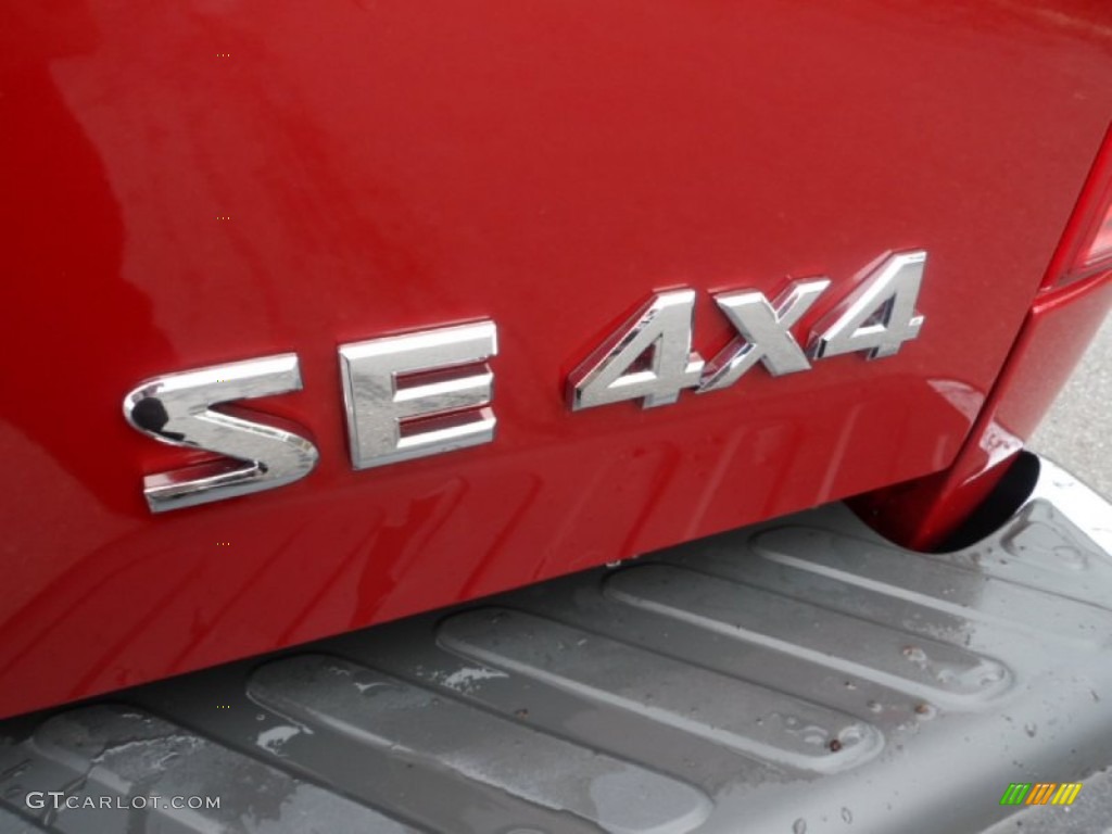 2010 Nissan Frontier SE V6 King Cab 4x4 Marks and Logos Photos