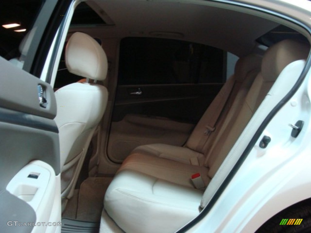 2011 G 25 x AWD Sedan - Moonlight White / Stone photo #13
