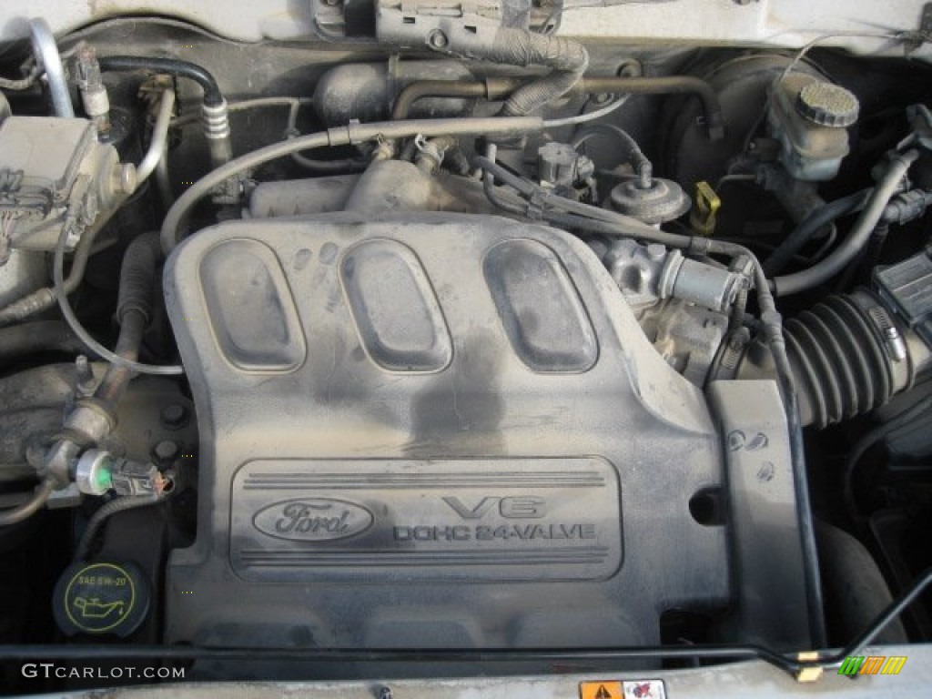 2004 Escape XLS V6 4WD - Satin Silver Metallic / Medium/Dark Flint photo #31