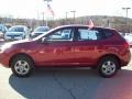 2009 Venom Red Nissan Rogue S AWD  photo #2