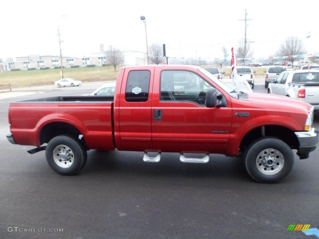 2002 F250 Super Duty XLT SuperCab 4x4 - Toreador Red Metallic / Medium Flint photo #2