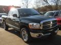 2006 Brilliant Black Crystal Pearl Dodge Ram 1500 SLT Quad Cab 4x4  photo #1