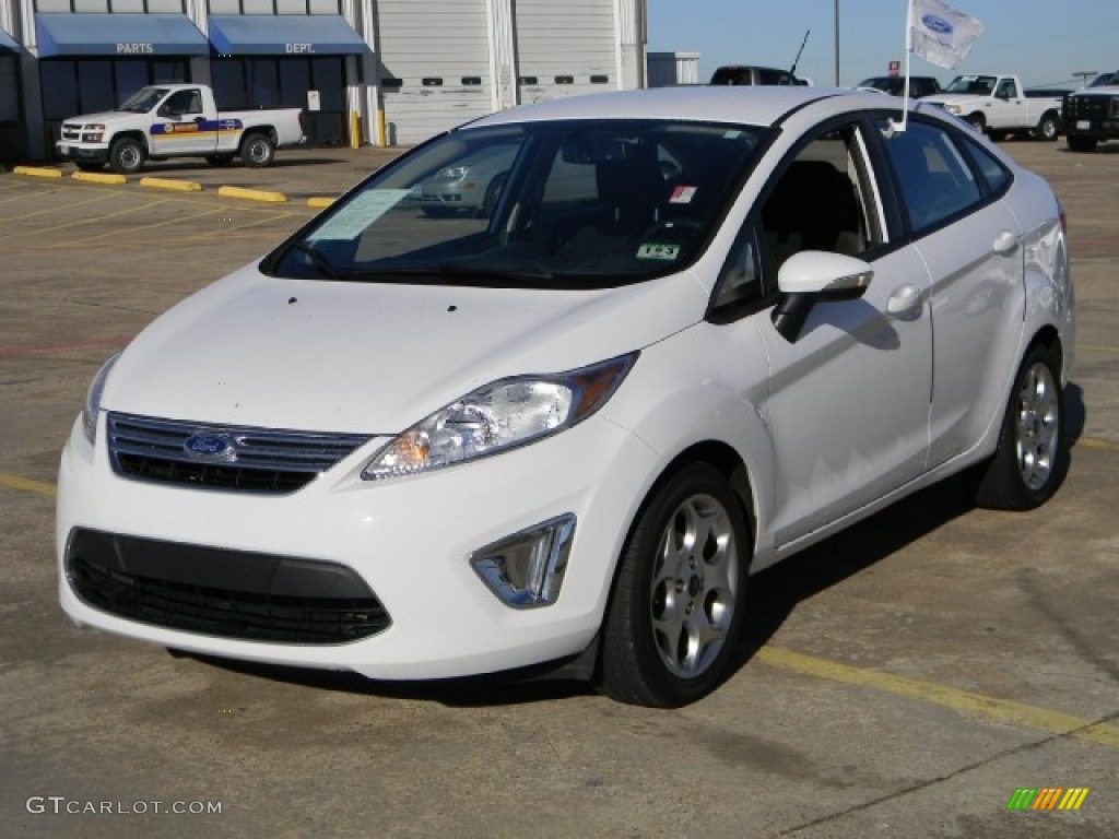 2011 Fiesta SEL Sedan - Oxford White / Charcoal Black/Blue Cloth photo #1