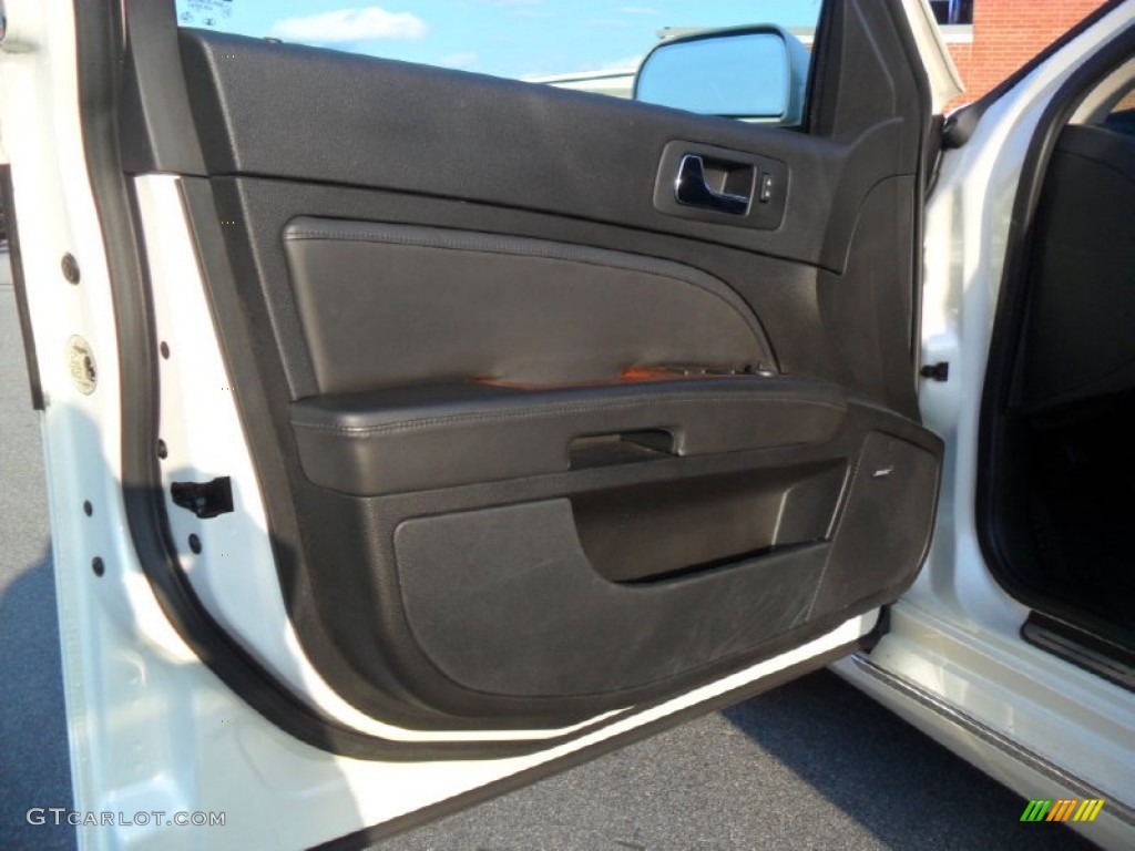 2011 Cadillac STS V6 Premium Ebony Door Panel Photo #59572279