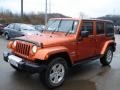 2011 Mango Tango Pearl Jeep Wrangler Unlimited Sahara 4x4  photo #4