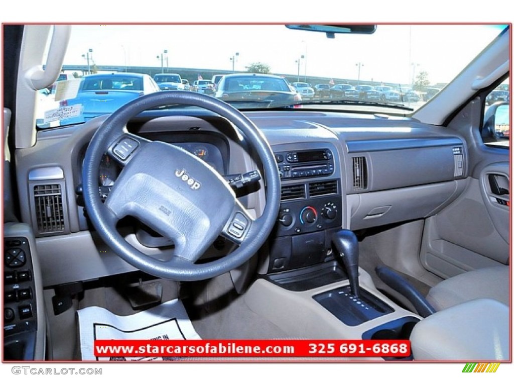 2002 Grand Cherokee Laredo - Dark Garnet Red Pearlcoat / Taupe photo #22