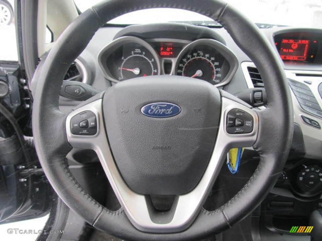 2011 Ford Fiesta SEL Sedan Charcoal Black/Blue Cloth Steering Wheel Photo #59619018