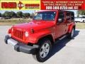 2010 Flame Red Jeep Wrangler Unlimited Sahara 4x4  photo #1