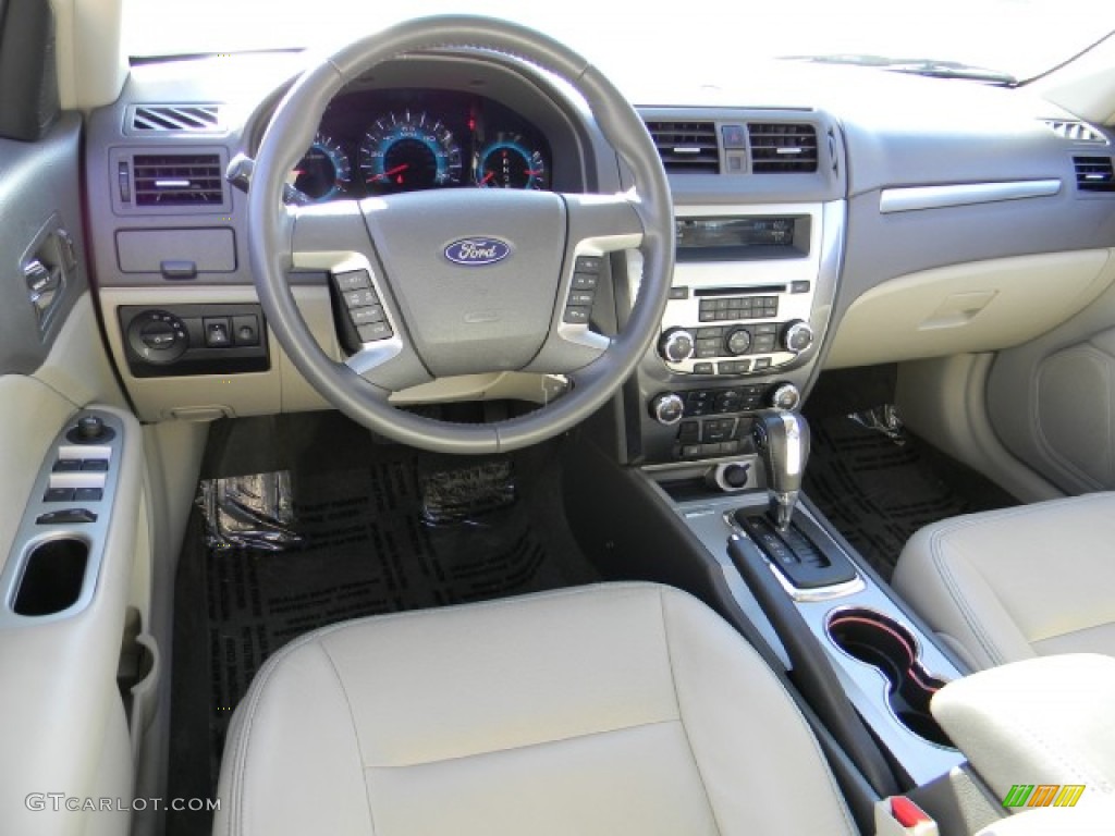 2011 Fusion SEL V6 - Tuxedo Black Metallic / Medium Light Stone photo #8