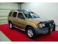 2000 Gold Metallic Nissan Xterra SE V6  photo #1