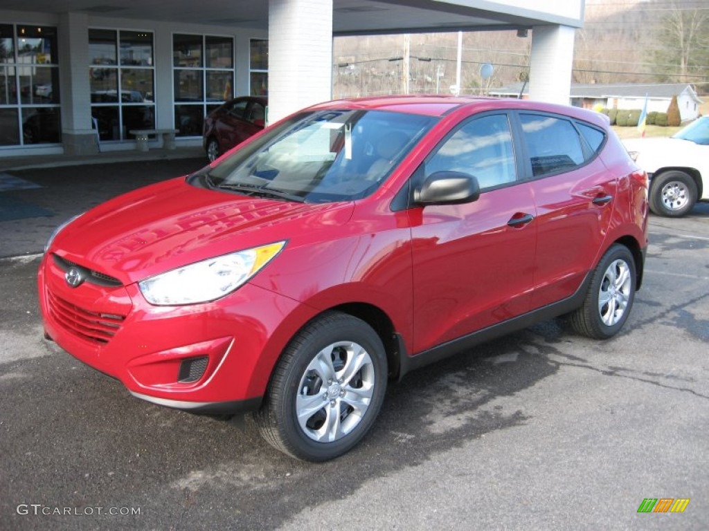 Garnet Red 2012 Hyundai Tucson GL Exterior Photo #59701810