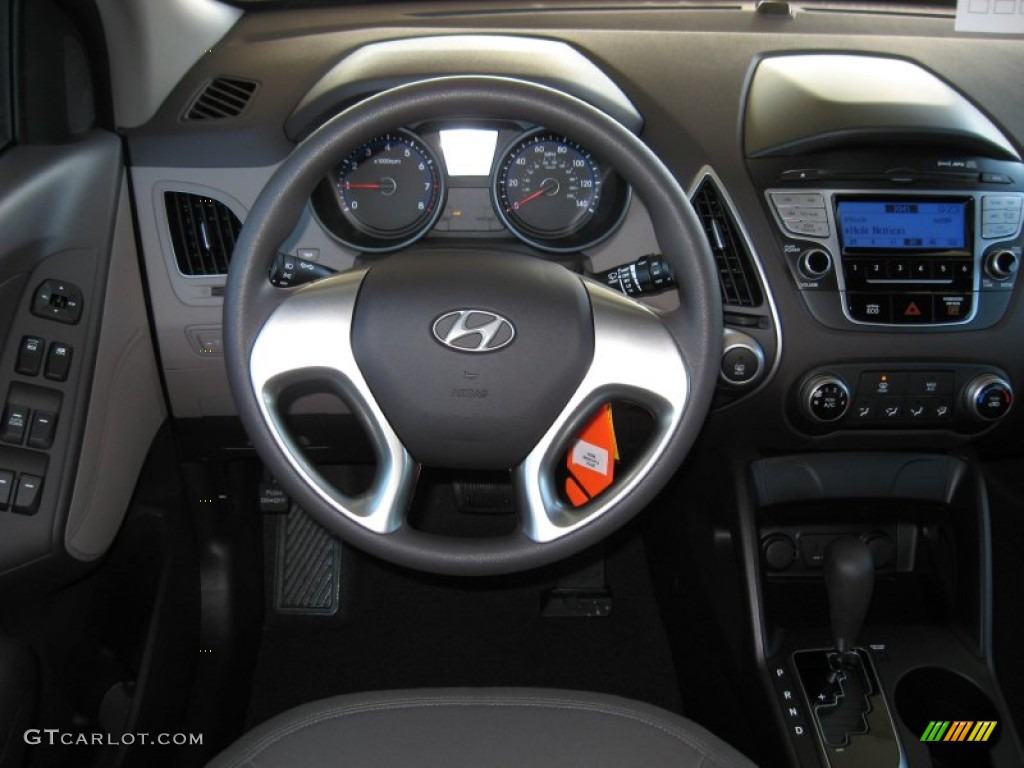 2012 Hyundai Tucson GL Taupe Dashboard Photo #59701974