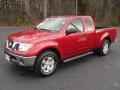 Red Brick 2010 Nissan Frontier SE V6 King Cab Exterior
