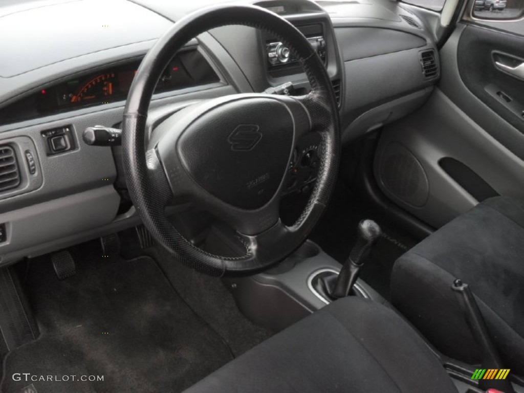 2004 Aerio LX Sedan - Cool Beige Metallic / Black photo #24