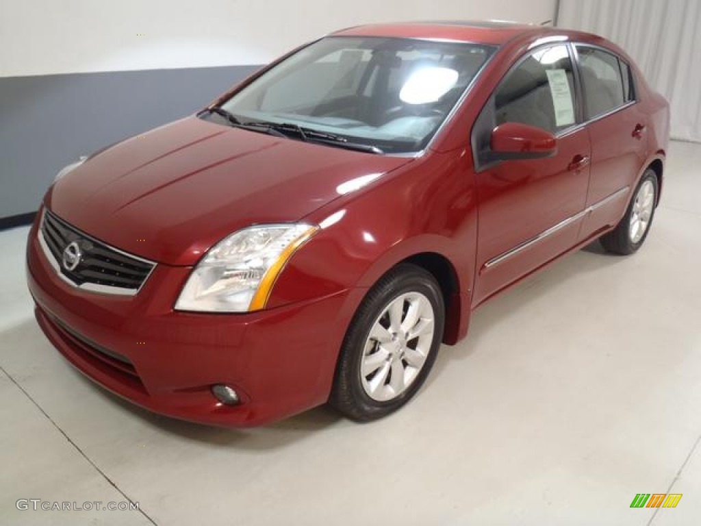 2010 Sentra 2.0 SL - Red Brick Metallic / Charcoal photo #17