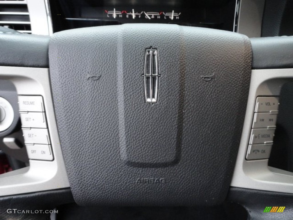 2009 Navigator L 4x4 - Sangria Red Metallic / Charcoal Black photo #16